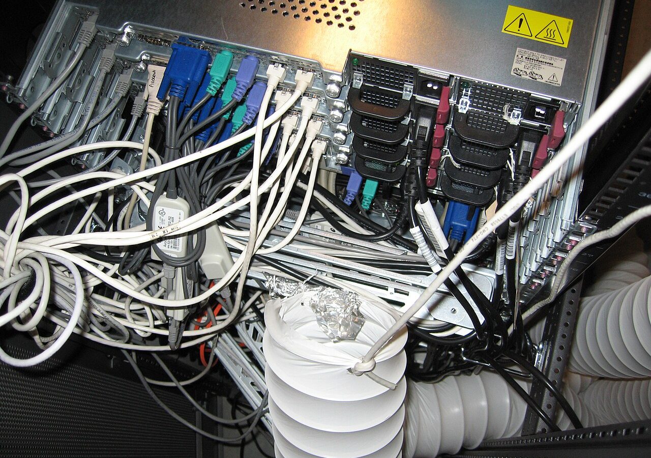 Server racks and cabling in a computer room