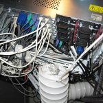 Server racks and cabling in a computer room