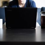 Laptop and coffee on a desk